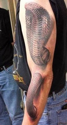 Amazing tattoo design that looks like it goes inside the arm. 1000+ images about cobra tattoo on Pinterest | Cobra tattoo, Design and Back tattoos