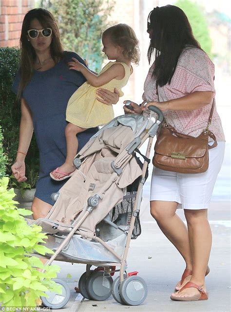 Wife offers herself to stud. Hilaria Baldwin enjoys a morning stroll with young Carmen ...