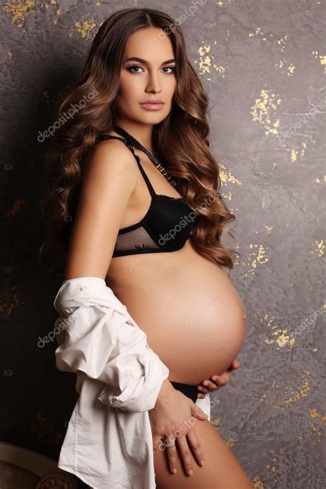The use of shackles or restraints on pregnant women is still a common practice in prisons and jails in the united states. beautiful pregnant woman with luxurious dark hair — Stock ...