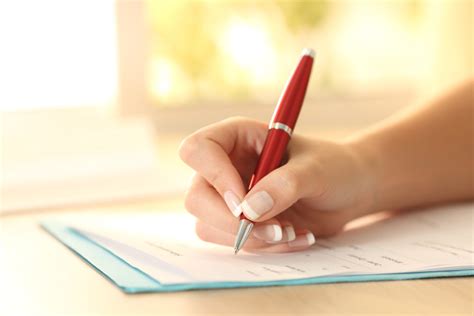 Cigna choice fund hra/fsa claim forms. Woman hand filling form on a table - HSF Ireland