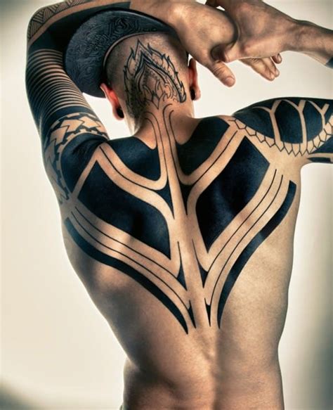 Make those lines a bit more soft and curvy and your tattoo will be more feminine. Tribal Tattoo Cover Up Ideas - Stylendesigns