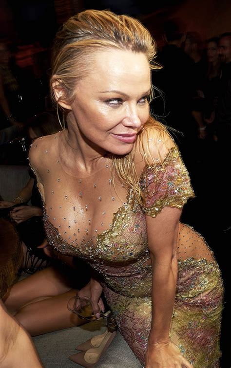 Don't tell me what i'm doing; Pamela Anderson's ample assets SPILL OUT of LBD as she ...