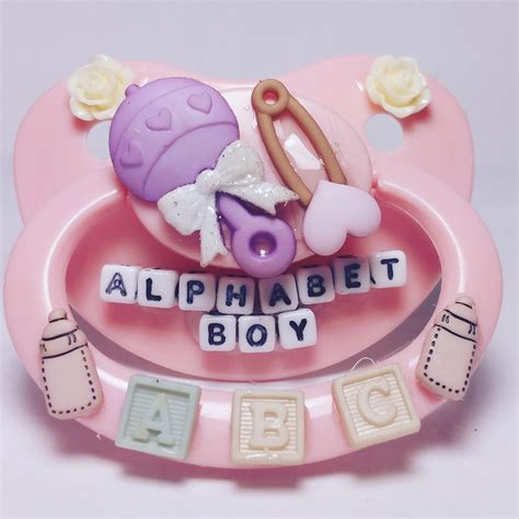 Well, we start with abc. Alphabet boy ddlg paci · LittlesOwlShop · Online Store Powered by Storenvy