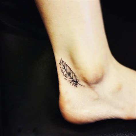Feather tattoo behind the ear. Cute Tattoos That Mean Something | Foot tattoos, Feather ...