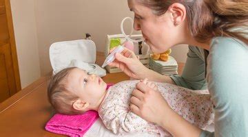 When water becomes trapped in your ear after swimming or bathing, it can lead to ear infections and other complications if left untreated. How to Clean Wax from a Baby's Ear | Hello Motherhood