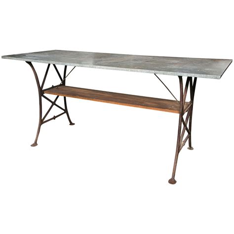 Curbside pickup · everyday low prices · savings spotlights Industrial Tin Top Table with Wooden Shelf at 1stdibs