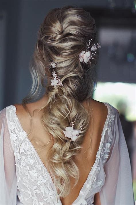 It is nice to have a uniformed look for the bridesmaids (perhaps a prettier adapted look for the younger flower girls, and a slightly different look. Wedding Hairstyles Best Ideas For 2020 Brides | Summer ...