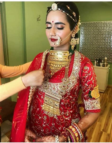 A marital dress, typically all white and decorated with frills and veils. Shivani Rathore 💫 | Rajput jewellery, Rajputi dress ...