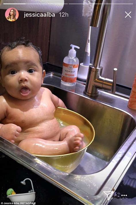 Baby taking bath in kitchen sink. Jessica Alba post pic of three-month-old son taking a bath ...