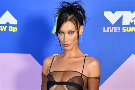 Since the tattoo is just a bud, therefore, it represents a new beginning or youthfulness. Bella Hadid shows off two new shoulder tattoos ...