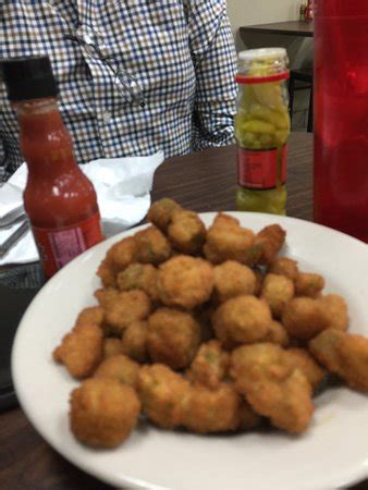 Lightly breaded chicken breast, served over a bed of spaghetti noodles and marinara sauce. Vivian's Soul Food, Cedar Rapids - Restaurant Reviews ...