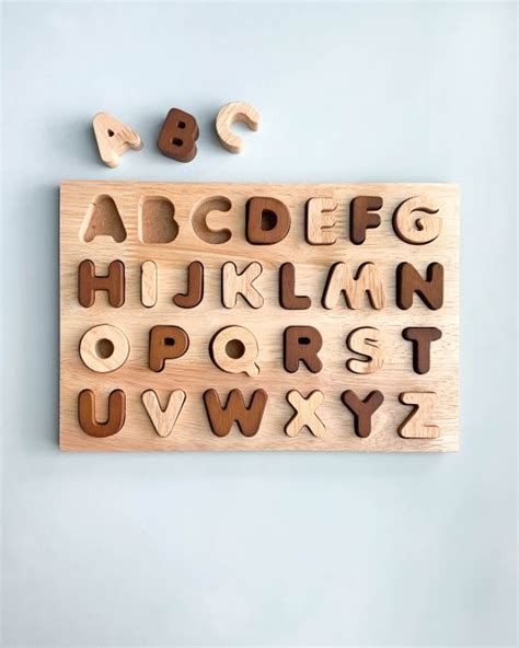 8 letter word list · zyzzyvas · jazzlike · vajazzle · buzzbomb · jacuzzis · quizzing · zizzling · bezazzes. Alphabet Puzzle | Alphabet puzzles, Wooden alphabet puzzle ...