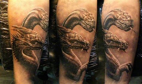 Check spelling or type a new query. Realistic tattoo of dragon and snake head. Awesome | Cool tattoos, Tattoos, Combat boots