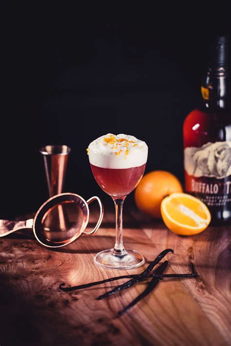 The perfect, boozy winter drink that utilizes jam instead of fresh fruit to keep it seasonal. Bonsai Bourbon | Christmas cocktails, Coupe glass, Tableware