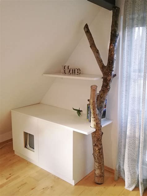 Was genau ist ein katzenklo schrank? Schrank mit Versteck für Katzenklo und Regal mit Baumstamm ...