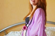pregnant redhead woman preview