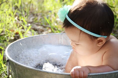 High angle view of shirtless boy relaxing in bathtub outdoors. Amelia's 9 Month Bubble Bath and Easter Photos, Menifee ...