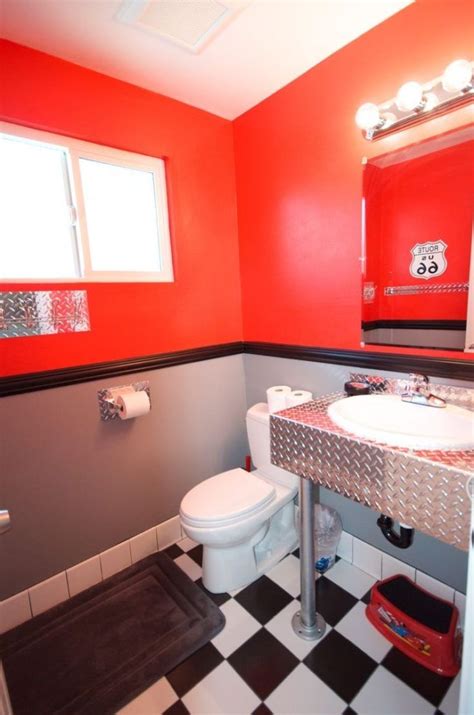 When it comes to tropical bathroom decor, color is almost always a key component. cars themed bathroom decor | Garage bathroom, Trendy ...