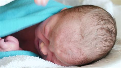 Silicone full body baby doll first bath! A Newborn Baby Girl Getting A Bath In The Hospital Stock ...