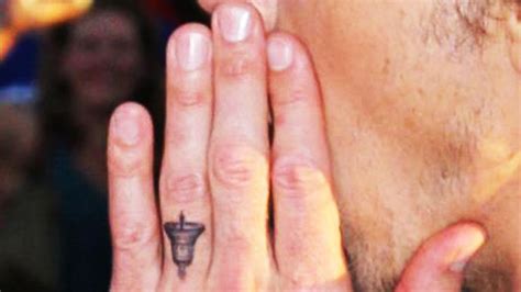 Would you do something similar? Dax Shepard Debuts Bell Tattoo On His Ring Finger To Honor ...