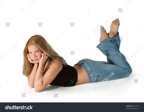 The shot is taken from above looking down on her from the thighs to her head. Blonde Teen Girl Lying On Her Stock Photo 2578279 - Shutterstock