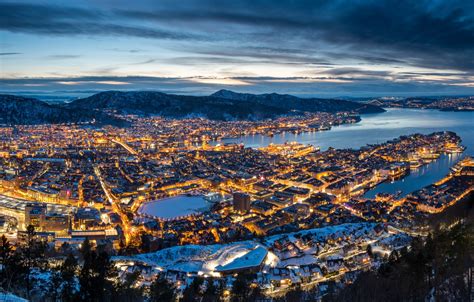 The city centre and northern neighbourhoods are on byfjorden, 'the city fjord', and the city is surrounded by mountains; Обои зима, горы, Норвегия, панорама, ночной город, Norway ...