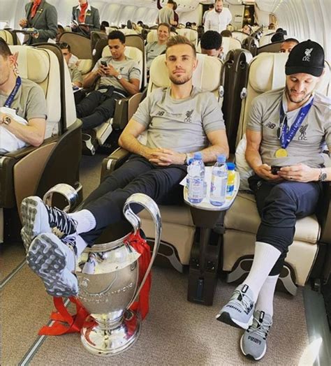 You've never expected girls to get so depraved! Liverpool players put their feet up with the Champions ...