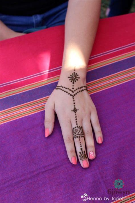 A henna tattoo matches up the profits that individuals can acquire in different sorts of wedding henna design. small simple henna - wrist to finger - chain - delicate ...