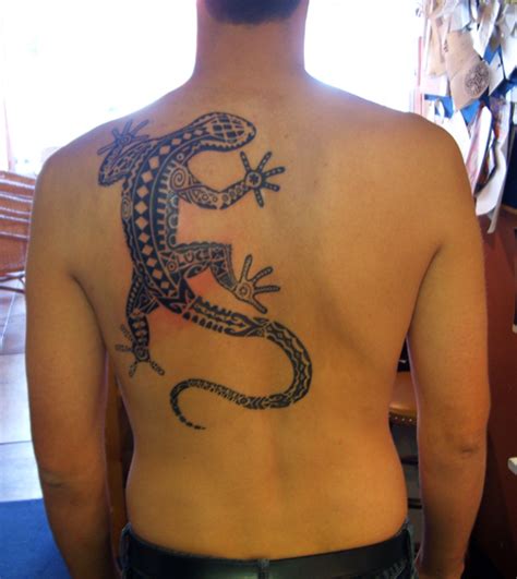 Nowadays they combine the style of original tribes and modern features. tribal lizard Tattoo - a photo on Flickriver