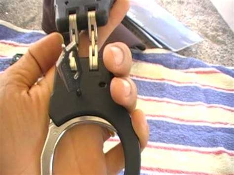 They comprise two parts, linked together by a chain, a hinge, or rigid bar. Hinge Handcuffs ASP - YouTube