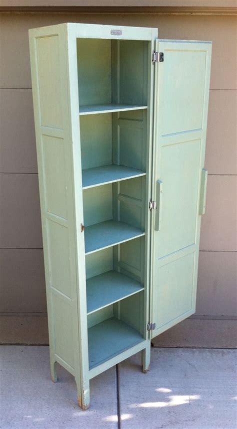 I also like the idea of the mirror over the stove to help open up the small space. 1940's vintage utility cabinet "SELLERS" label Original paint Good condition 19"W x 12"D x 70"H ...