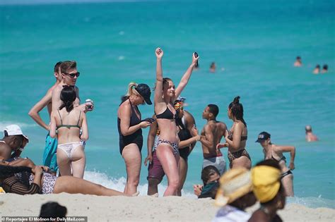 During the war she in 1916 joined a hospital unit. Spring breakers partying for St. Patrick's Day in South ...