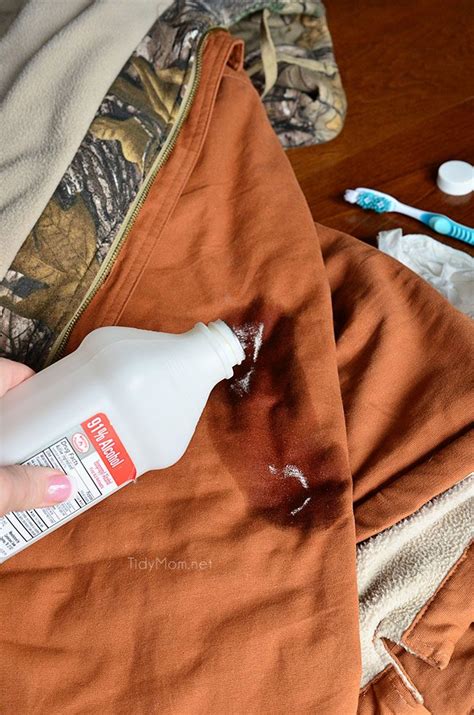 Sprinkle some baking soda onto a wet piece of cloth. How to get paint out of clothes after its dried ...