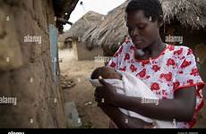 baby african newborn mother africa her holding amuria uganda east alamy shopping cart