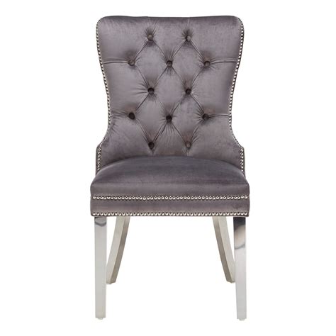 The velvety material looks and feels great, dig this mustardy gold color, and the varied design (straight lines on front, diamonds on back) is interesting. Remington Grey Velvet Dining Chair With Knocker