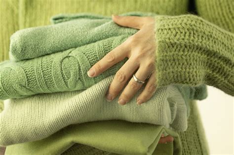 To dry the piece, lay it flat on a large towel and roll the sweater in it to avoid unnecessary stretching. How to Wash Dry and Reshape Sweaters