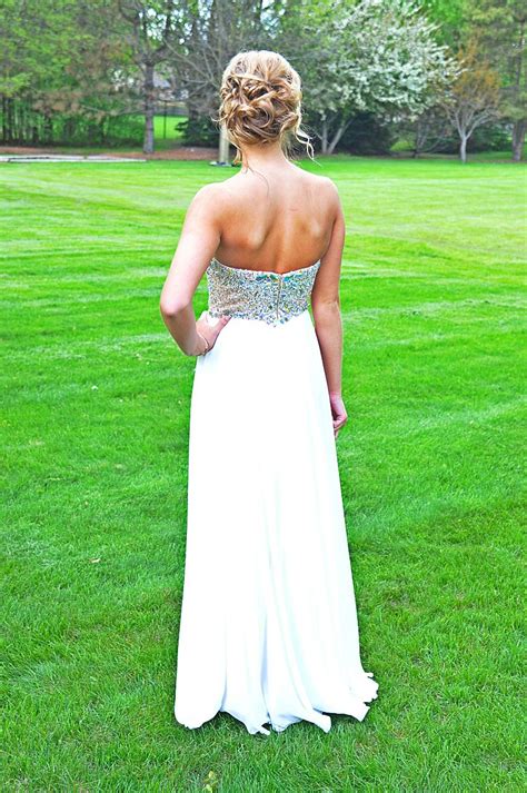 Messy bun hairstyles are the ultimate simple updo, and there's a messy bun you can wear for any day or occasion. Prom hair! Messy bun! | Dresses, White formal dress ...