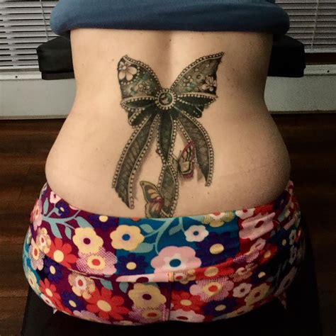 The cost and the time involved in a back tattoos for men. Beautiful Lace Bow Lower Back Tattoo - Blurmark