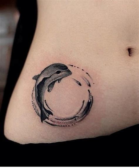 What kind of tattoo is a watercolor? Lovely dolphin tattoo by Chen Jie