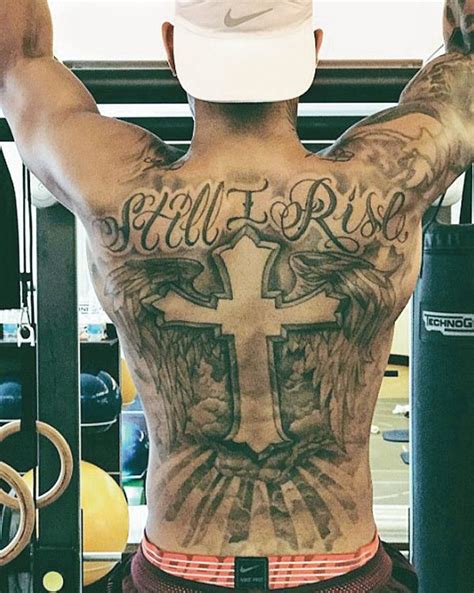 Looking at a sport like formula 1 you don't always get a good sense of a driver's tattoo. Lewis Hamilton - Zwischen Hass und Heldentum - Tattoo Spirit