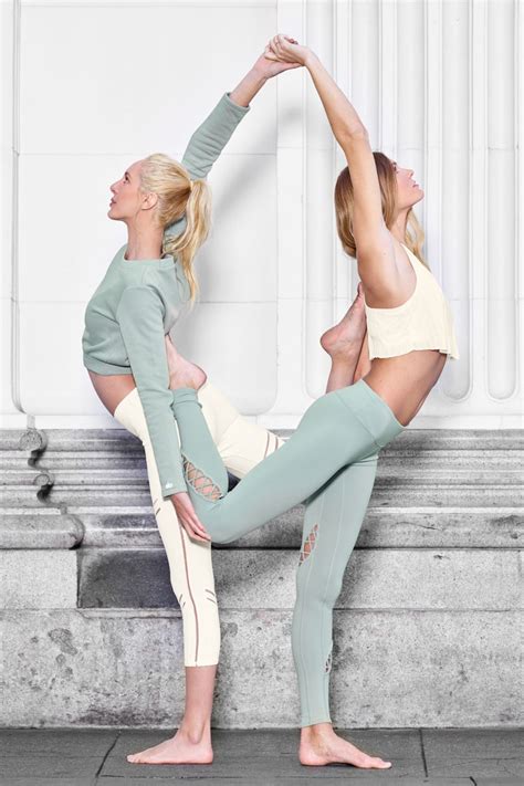 A couples yoga routine your guy will actually love. @sjanaelise is featured in Elite Long Sleeve Top and High ...