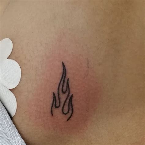 The devotion to the sacred heart seeks to remind christians of jesus's eternal connection to his love and passion for human kind. Simple Heart On Fire Tattoo