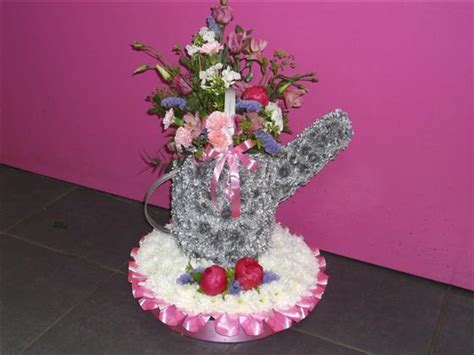 Even if it's cold hard cash, describe how you'll spend the stuff. watering can - Funeral Flowers Basildon