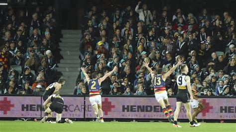 The supporter was seen waving her middle finger at betts before throwing the call to action was led by crows captain taylor walker, who tweeted his disappointment. AFL: Banana thrown at Eddie Betts, Port Adelaide fan banned | Herald Sun