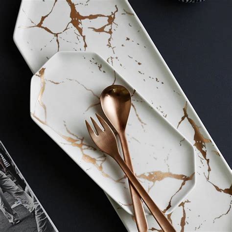 Check out our gold marble tray selection for the very best in unique or custom, handmade pieces from our decorative trays shops. Gold Inlay Marble Design Serving Dish | Marble plates, Marble, Plates