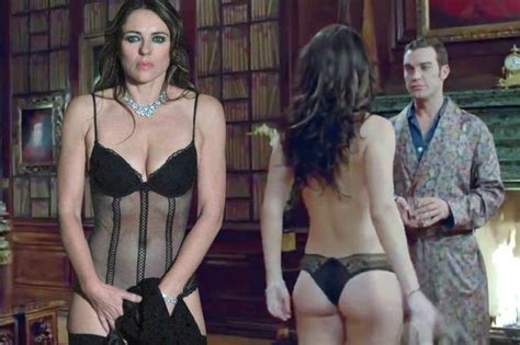She looks at herself through the mirror being proud of goodies. Liz Hurley 'loved' stripping to her underwear for new US ...