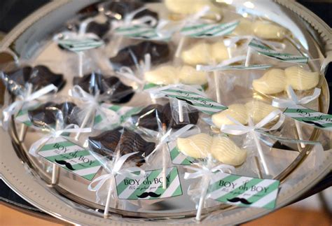 For the dessert table centerpiece, i used my three tier cupcake stand and covered it in chocolate and white icing cupcakes. "Little Man" Baby Shower Brunch - Life's Tidbits