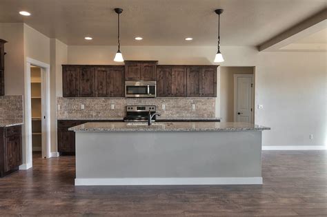 Our client wanted a much bigger island and so we added cabinets on the back side and they now have a 5' x 8' island with room for 6 stools. Going country has never looked so MODERN. Kodiak, Knotty ...