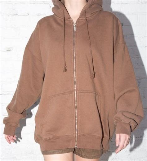 Hooded sweatshirt, front zip fastening, front pockets, long sleeves, regular length, oversized fit. Brandy melville brown carla hoodie in 2020 | Brown jacket ...