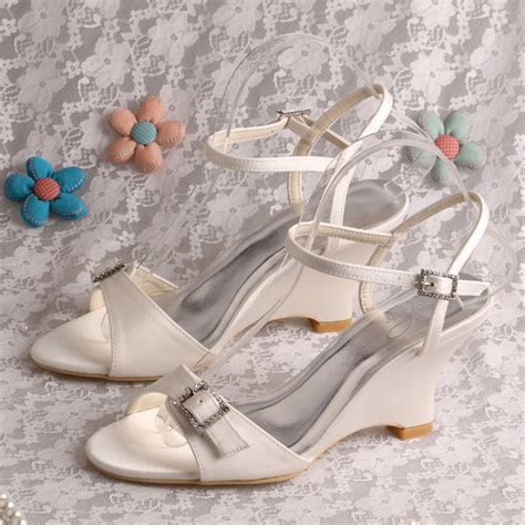 For christenings, weddings and formal events opt for a pair of light baby blue heels. Ivory Satin Strappy Dress Sandals for Wedding Lady's ...